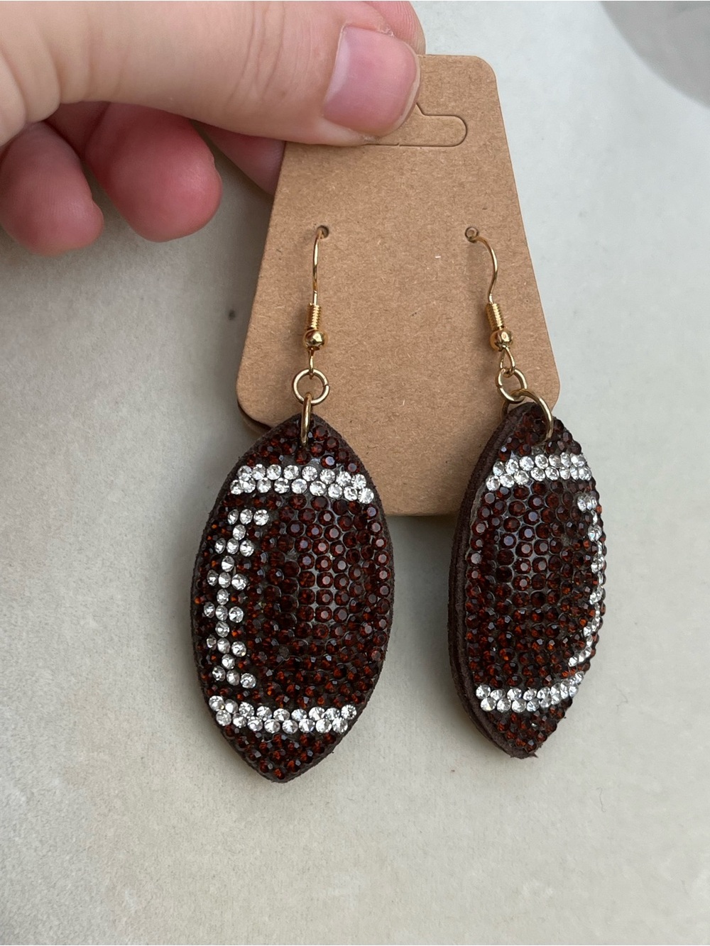 Bling rhinestone football dangle earrings